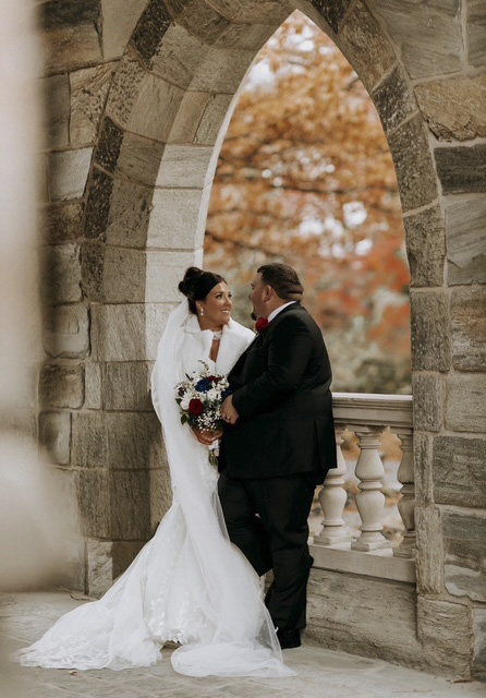Merion Tribute House Wedding photos in a historic archway